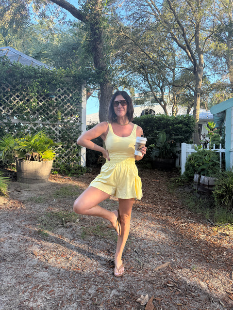 flounce + flow romper-yellow