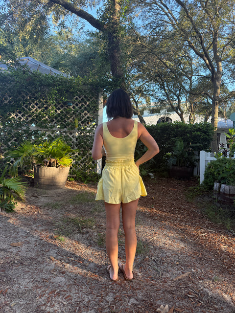 flounce + flow romper-yellow