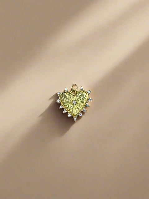 Gold heart charm